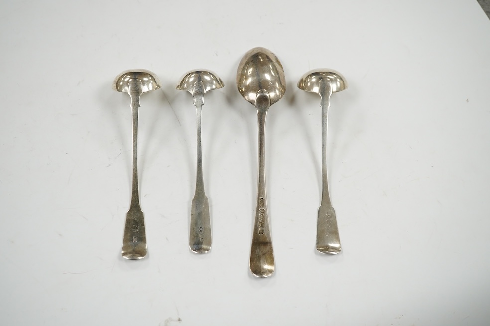 A George III silver table spoon by Hester Bateman, London, 1784, 21.5cm, together with three 19th century Scottish provincial silver toddy ladles by David Gray, Dumfries. Condition - fair